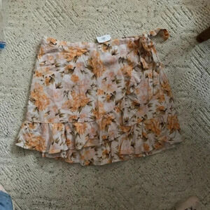 Flower Pattern ladies Skirt with a tie on the front & part elastic size XL